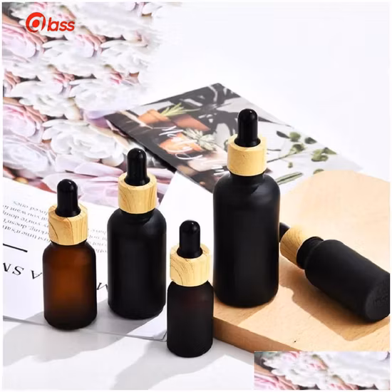 Packing Bottles Matte Black Coated Glass Dropper Bottle Boston Round Essential Oils Per with Wood Grain Plastic Cap Drop